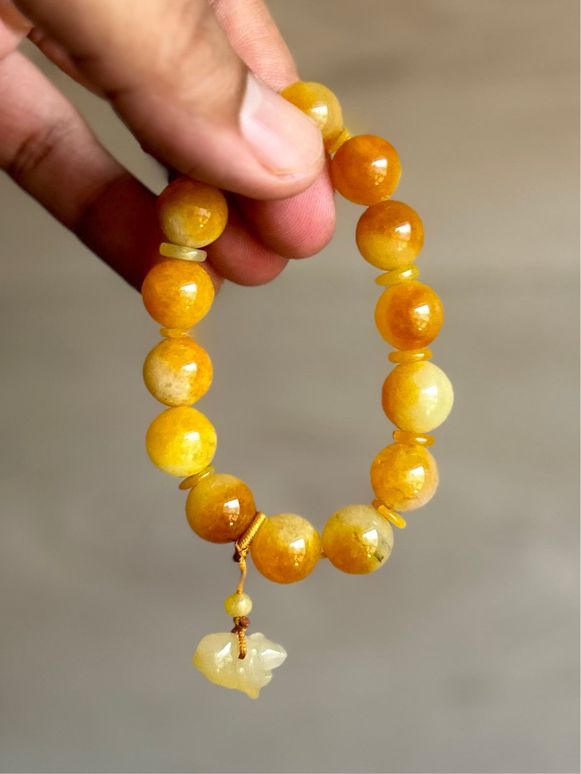 Burma Golden Imperial Jadeite Stretch Bracelet, 10mm Beads,
Length is 6”
